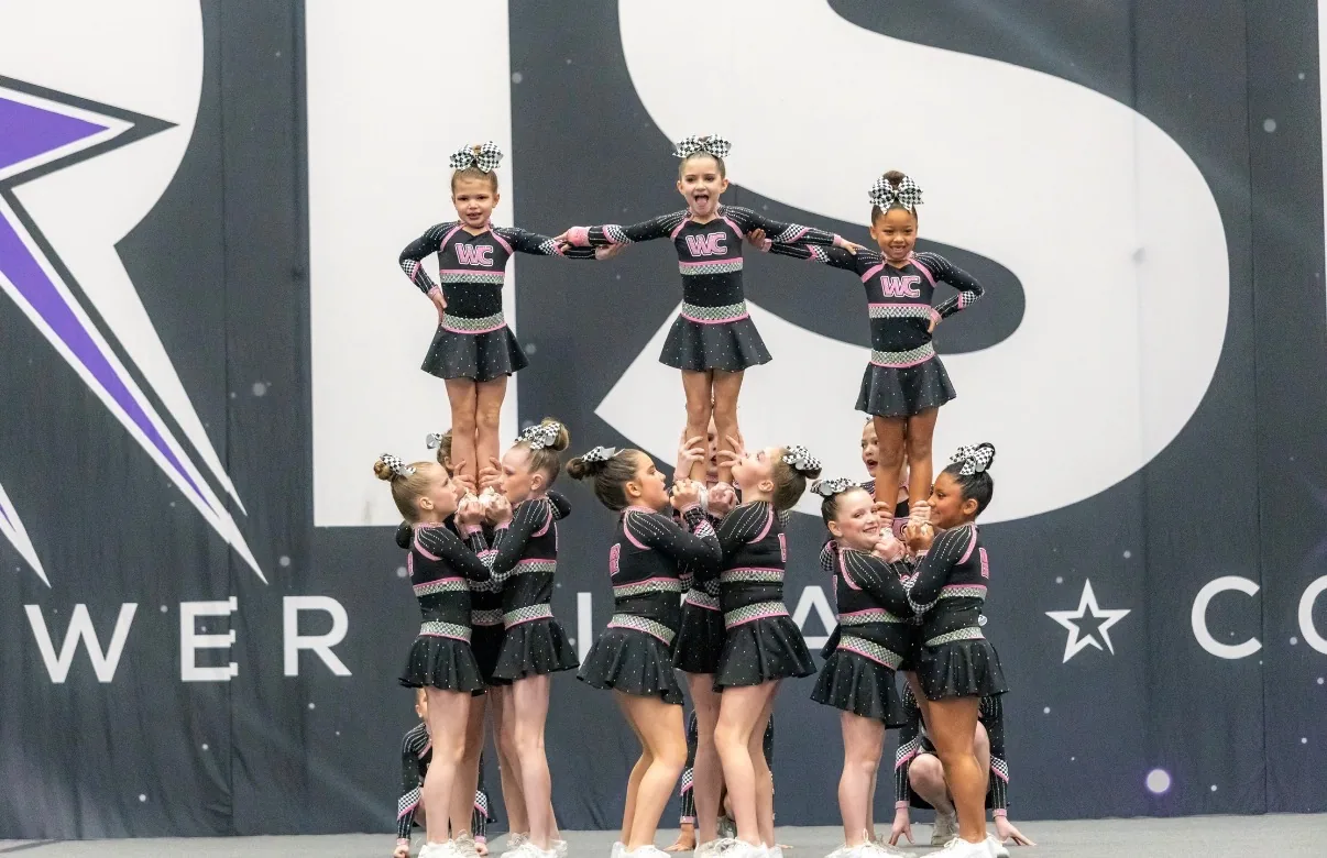 Winner Circle Athletics athletes training tumbling skills in the gym